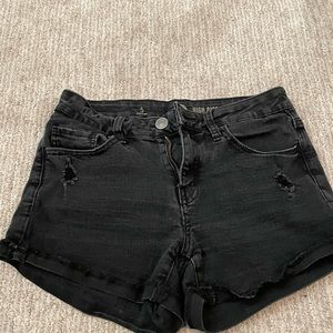 Black distressed jean shorts